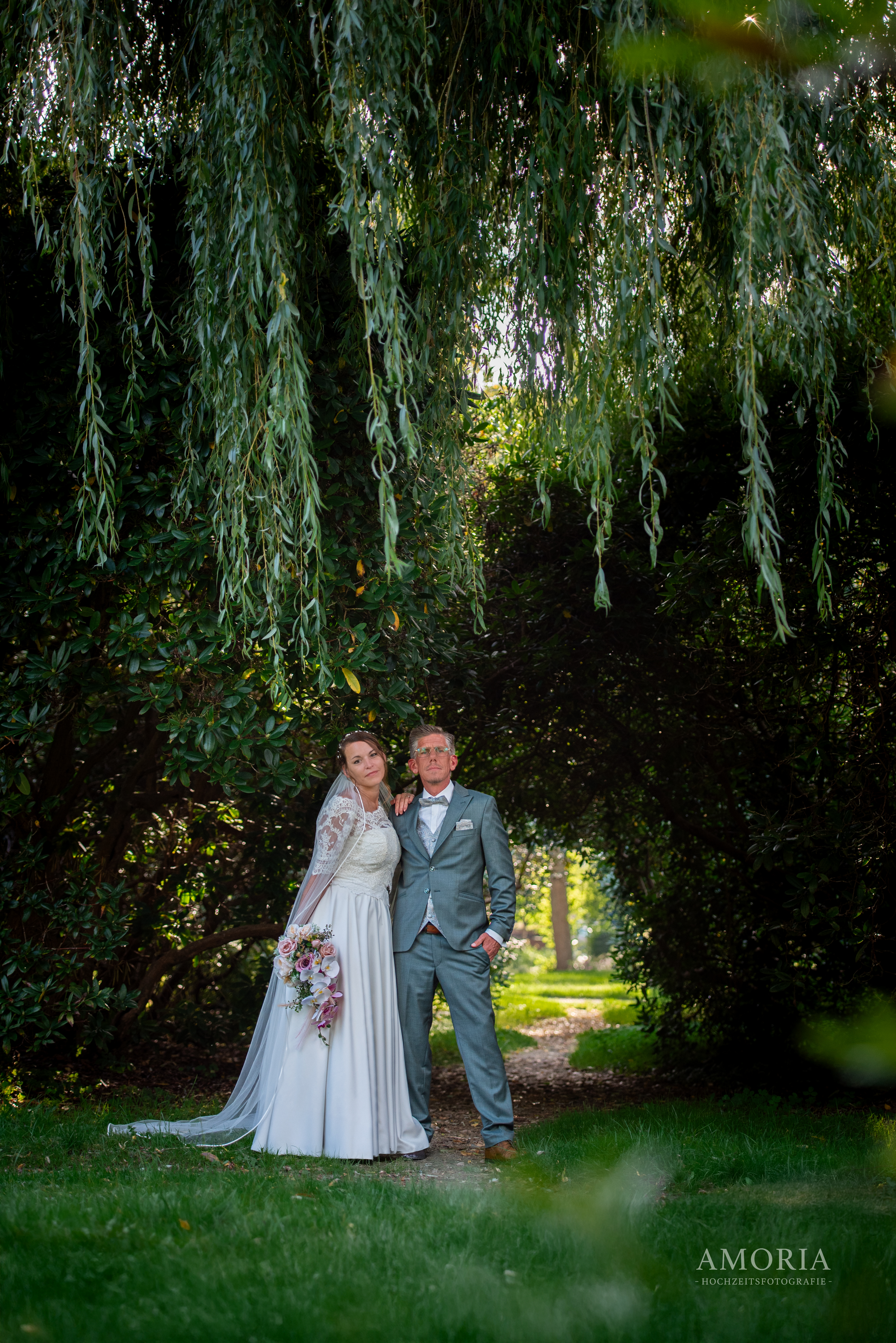 Hochzeitsfotografie Kiel - Brautpaar natürliche Fotos Amoria